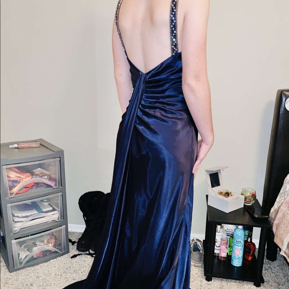 Wore dress once and takes up space in my closet.